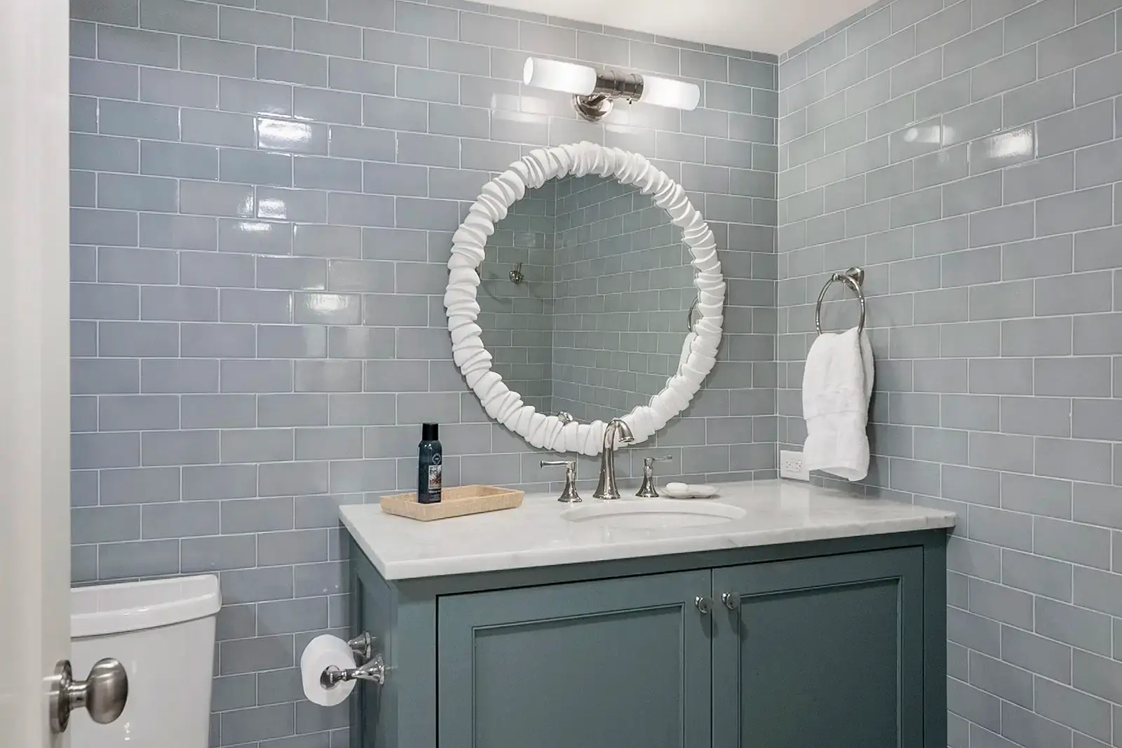 A full view of the renovated bathroom with cohesive design elements.