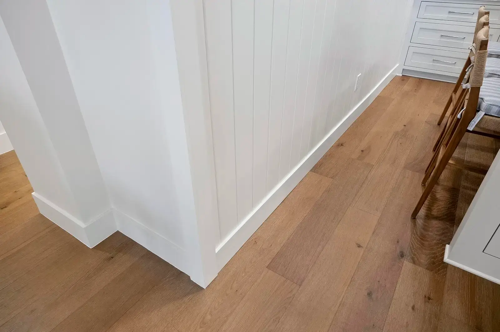 Detailed view of the new flooring, highlighting its texture and finish.