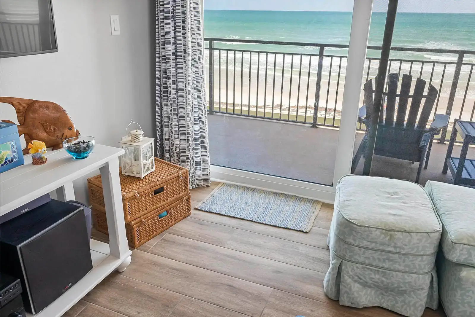 Elegant and durable vinyl plank flooring enhances the overall look of this Ponce Inlet condo renovation.