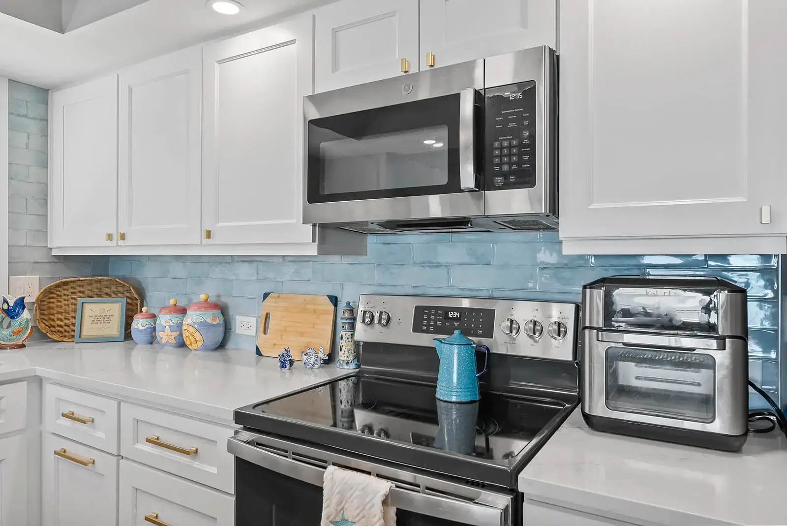 High-end appliances and countertops elevate the cooking experience in this Ponce Inlet condo renovation.