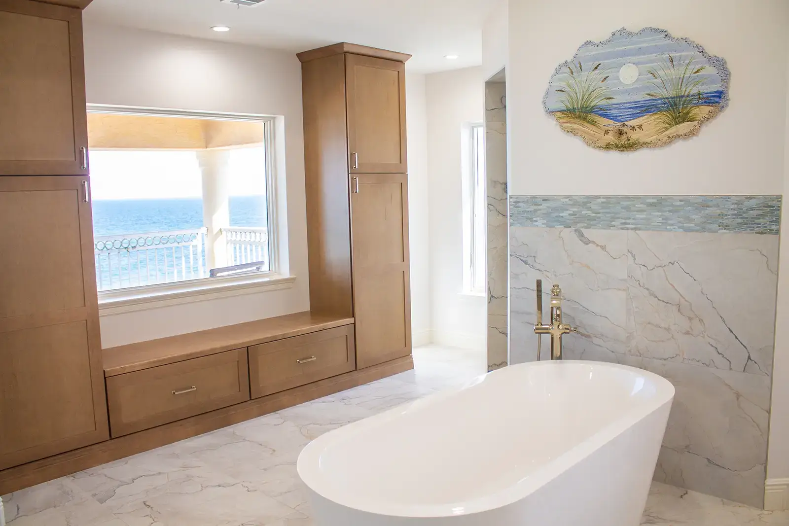 Looking left at tub and cabinets with window seating - Flagler Beach Florida