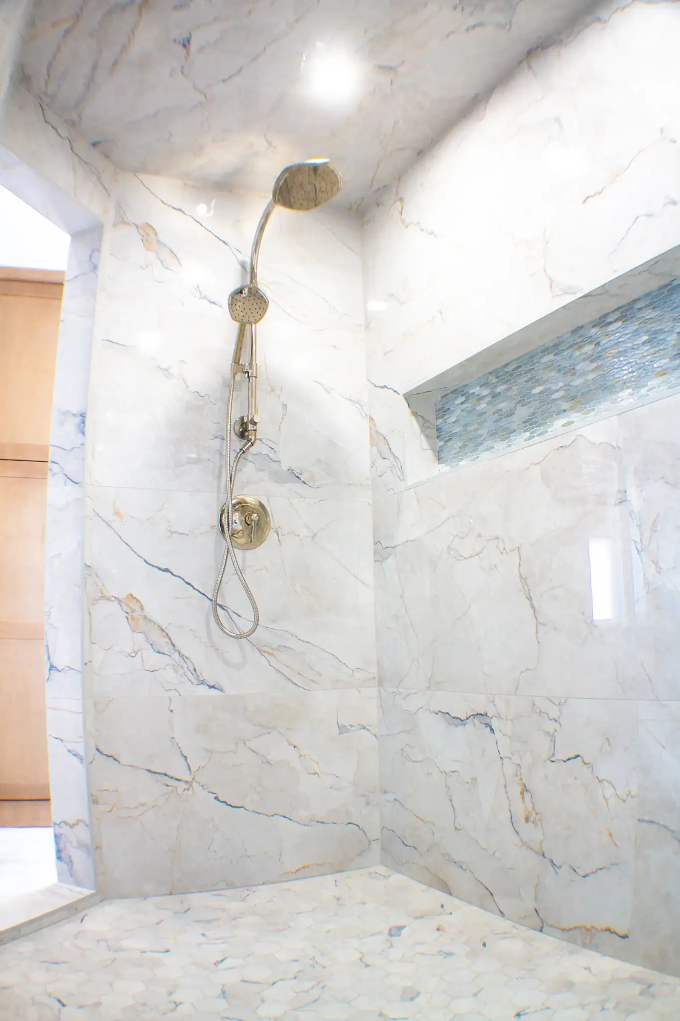 Second shower head in custom remodeled bathroom