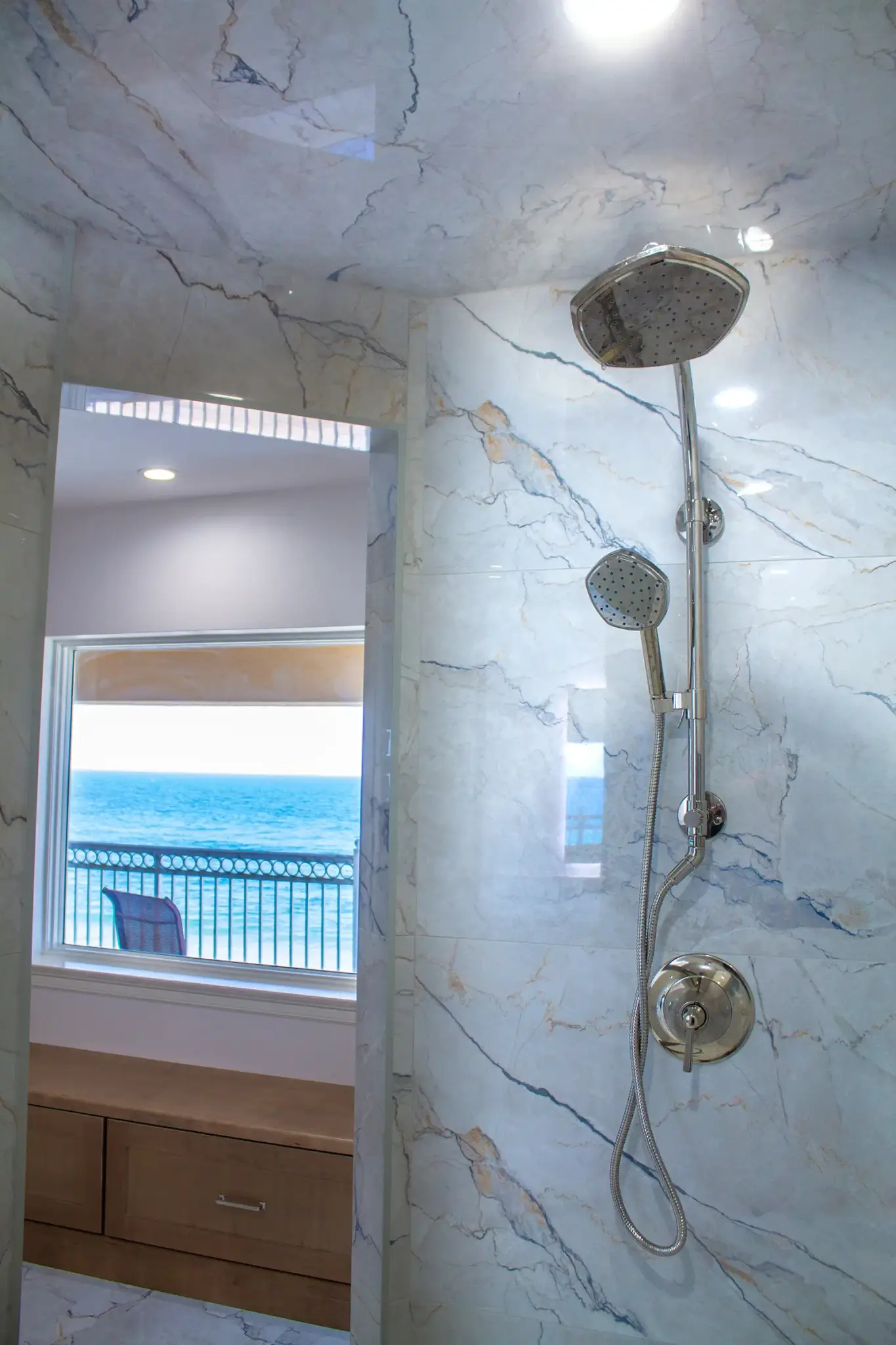 Second shower head and ocean view - bathroom remodel in Flagler Beach