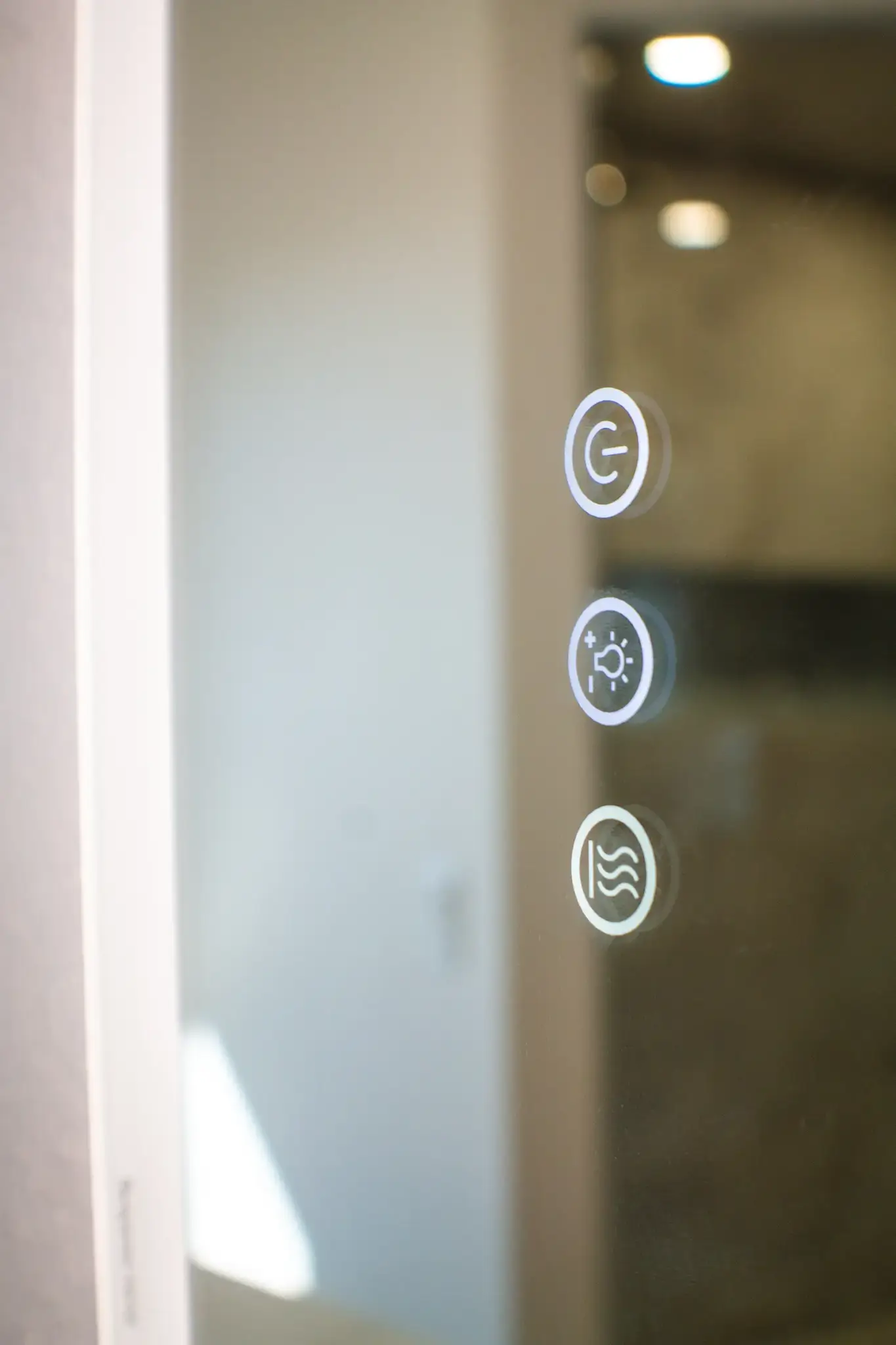 Mirror defogging and lighting controls